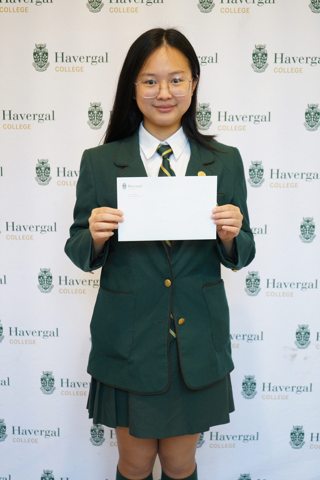 Student with envelope.