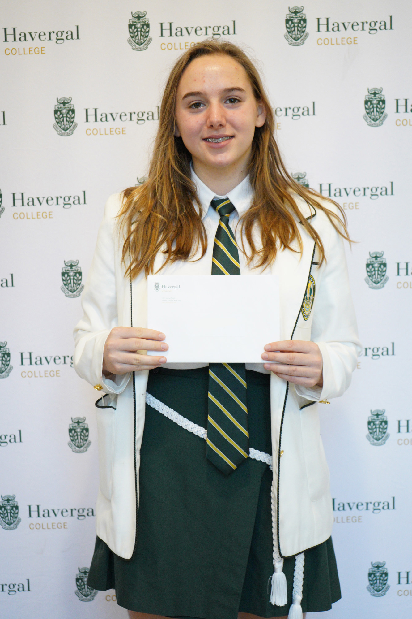 Student with envelope.