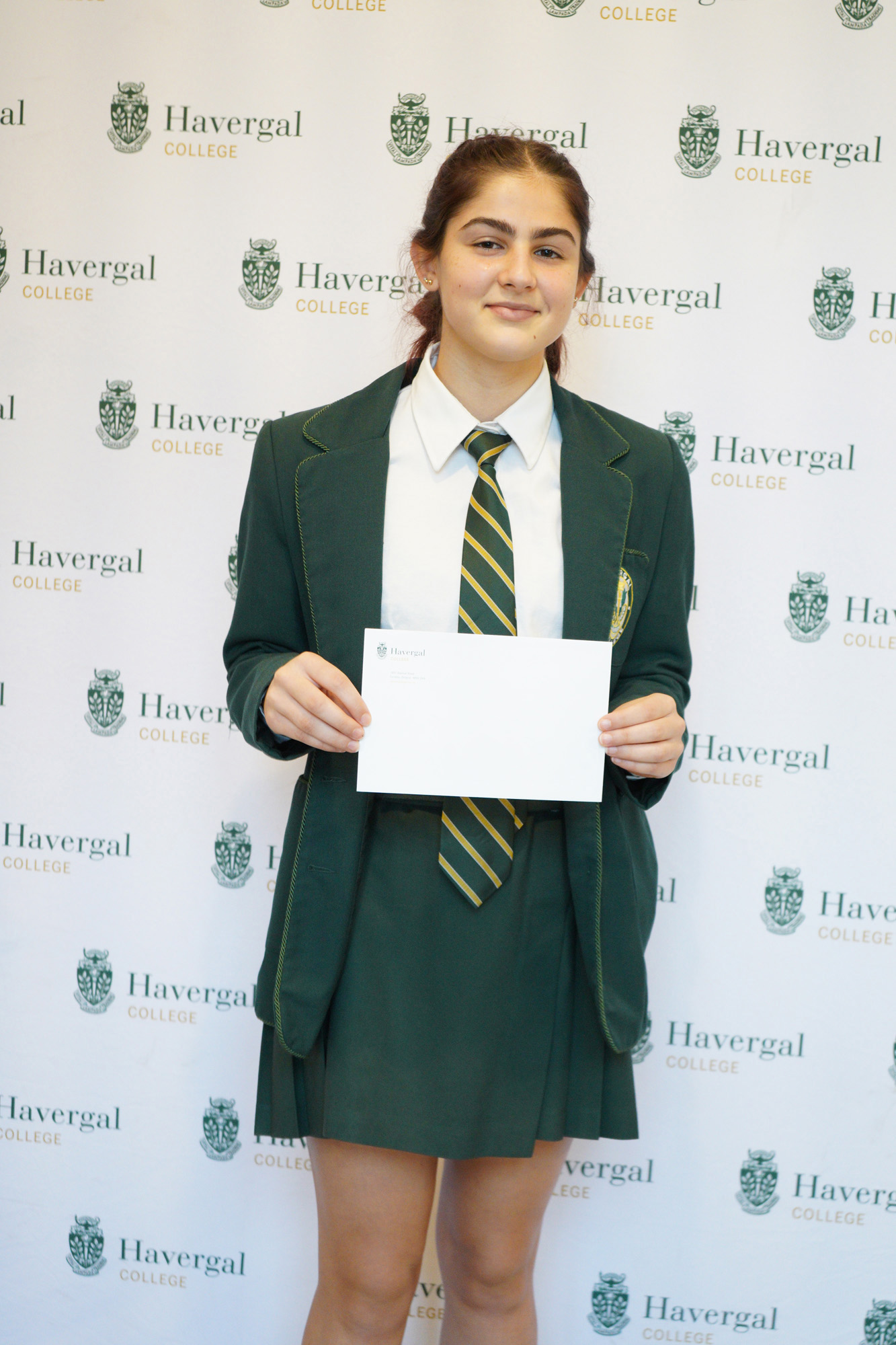 Student with envelope.