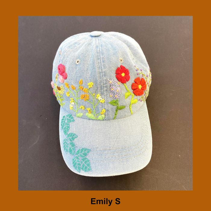 Flowers embroidered on hat.