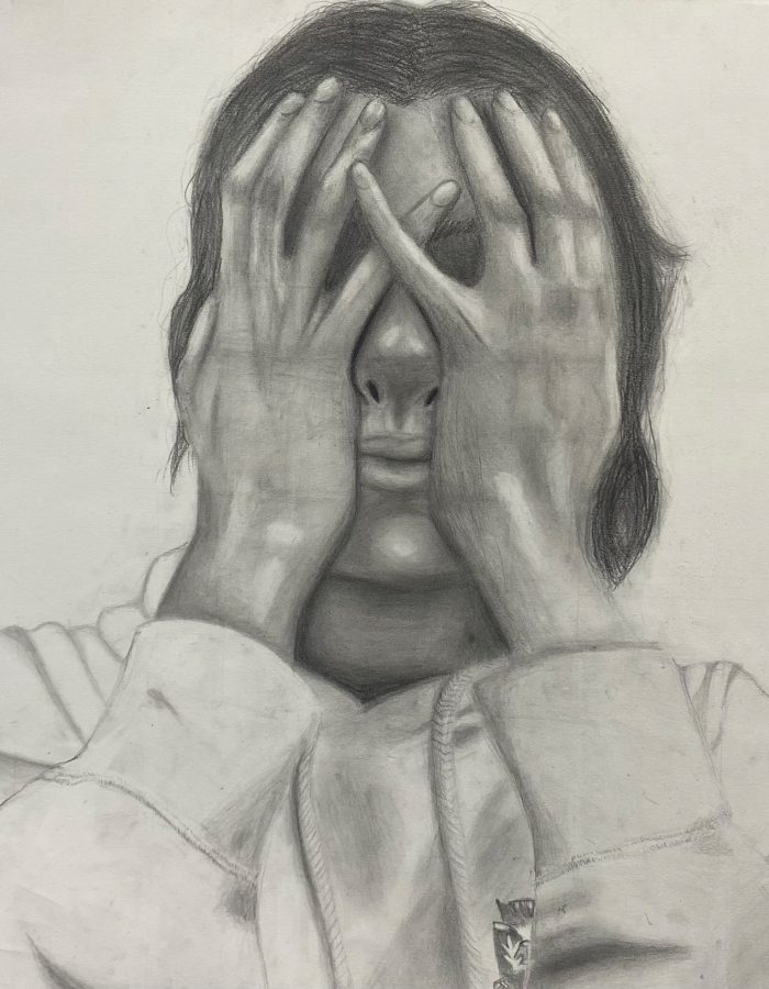 Sketch of someone covering their face.
