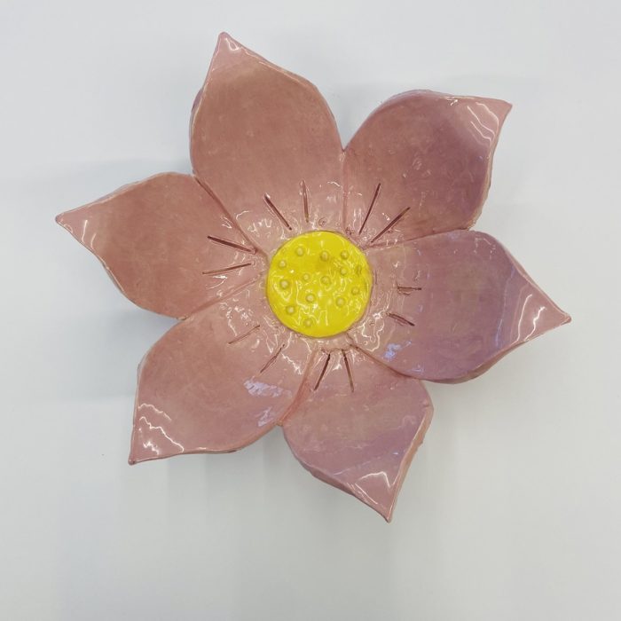 Pink pottery flower.