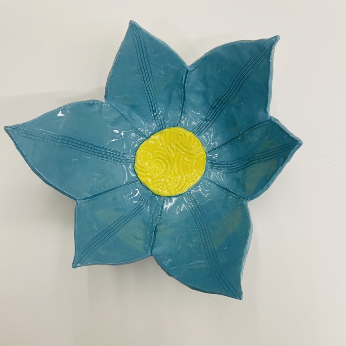 Blue pottery flower.