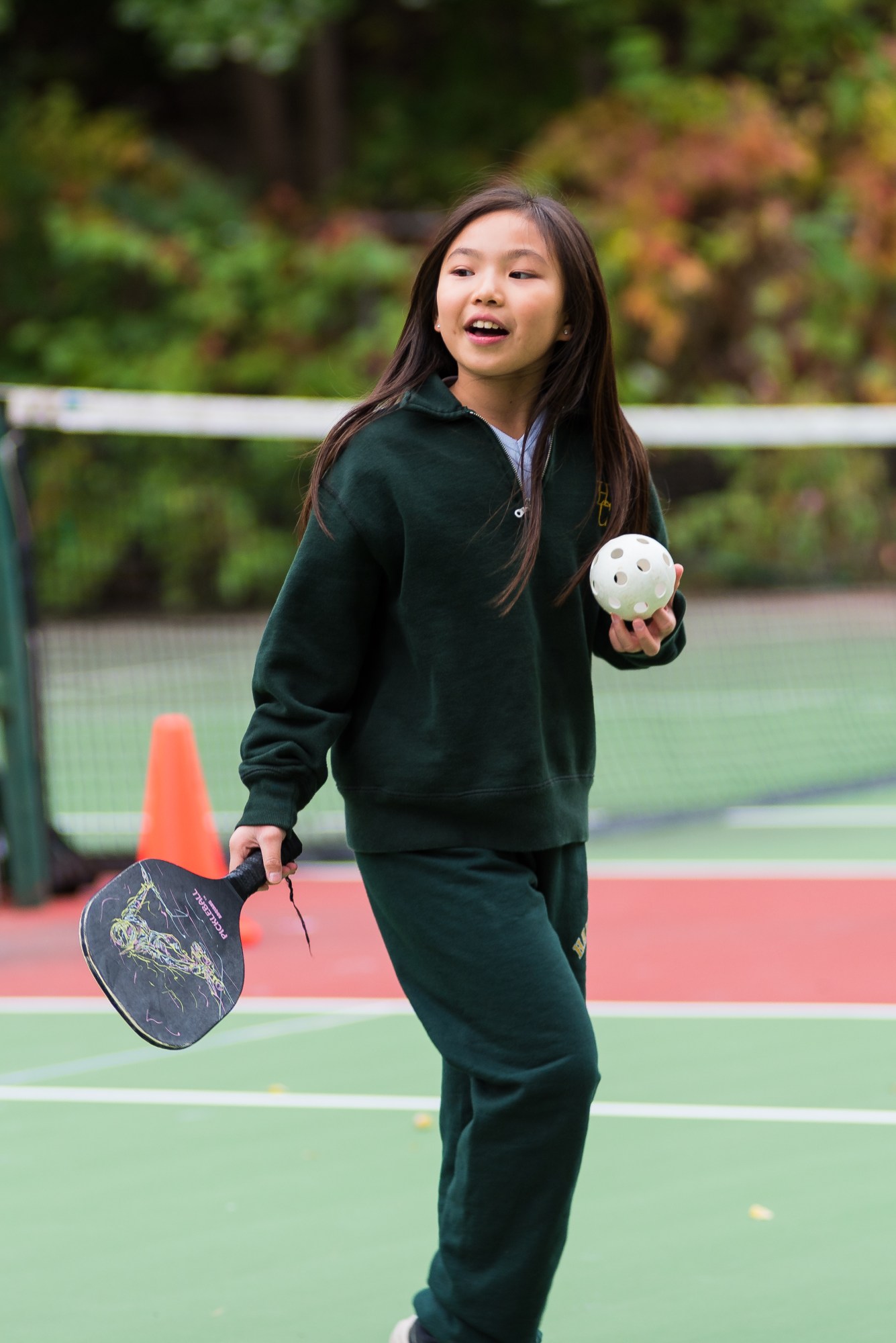 Junior School student playing pickleball.