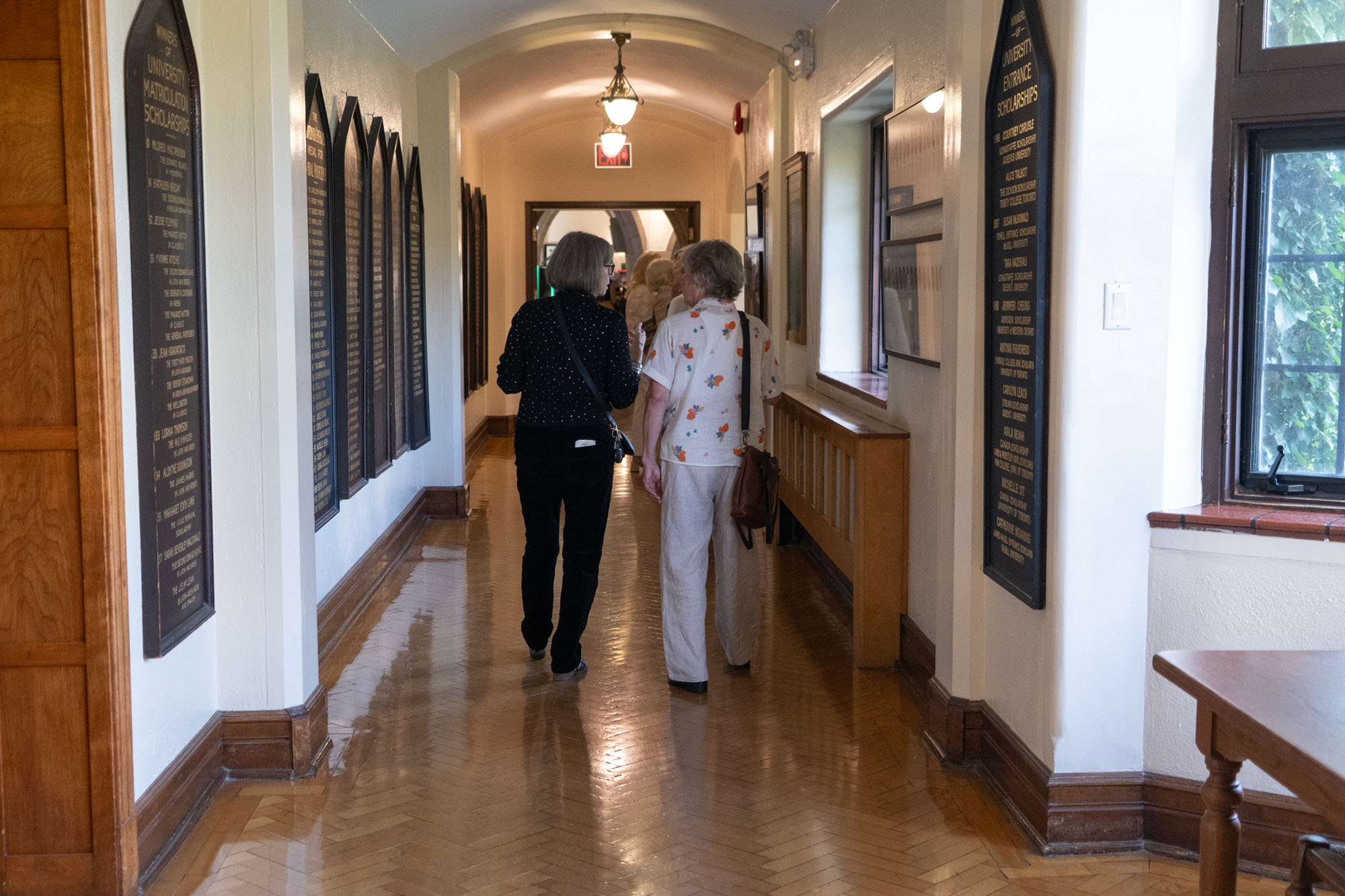 Alumni walking down the main hallways in the Upper School.